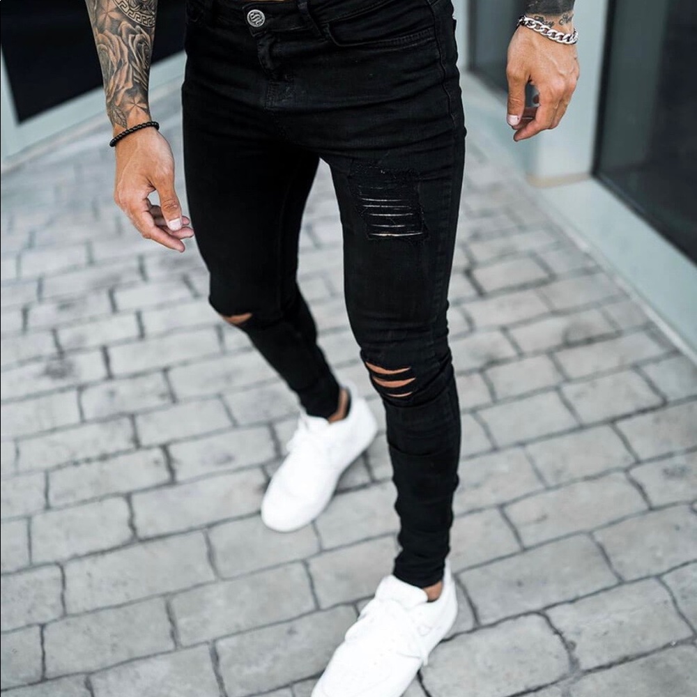 Ripped and Repaired Skinny Black Jeans